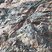 Filons de granite gris dans le granite rose